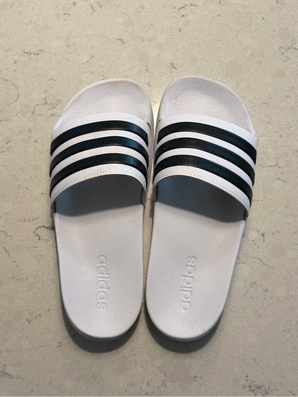 White and Black Adidas Slides - men’s size 8
